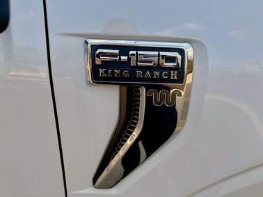 2021-Ford-f150-powerboost-f-150-badge-carprousa